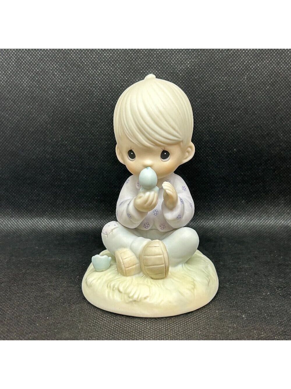 Precious Moments “I believe in miracles” figurine